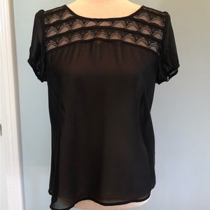 Sheer black cap sleeve blouse. Never worn. Forever 21